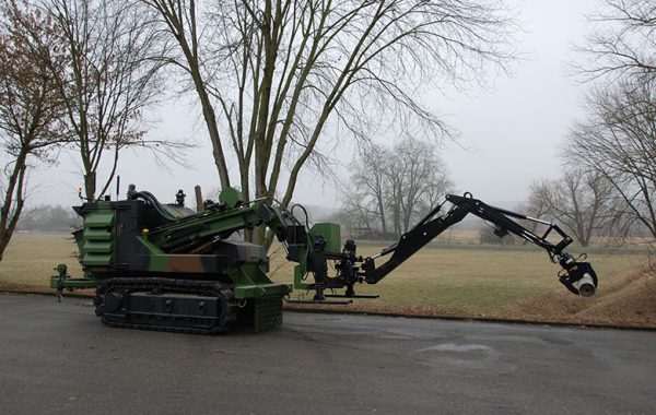 A75T (SDZ) with Backhoe extended to reach UXO